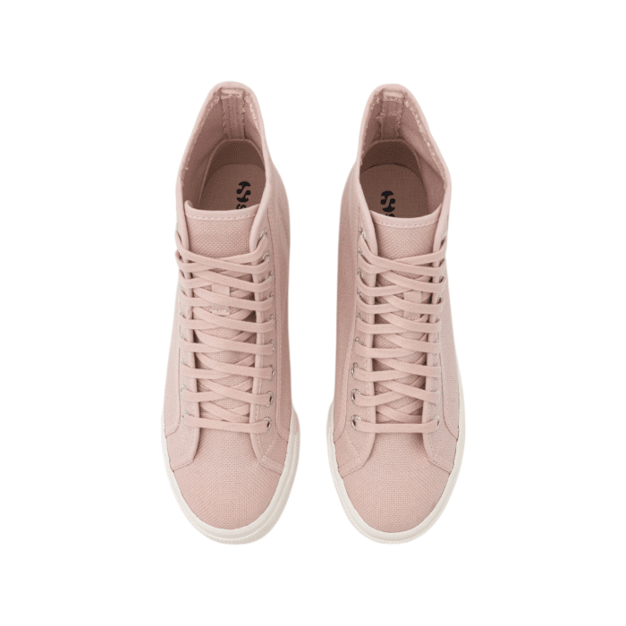 556 24B | The Superga 2708 Hi Top in pink features a breathable cotton canvas upper and comfortable cotton lining for all-day wear. With a platform heel, lace-up fastening, and durable synthetic sole, these sneakers offer a stylish and practical addition to your wardrobe.