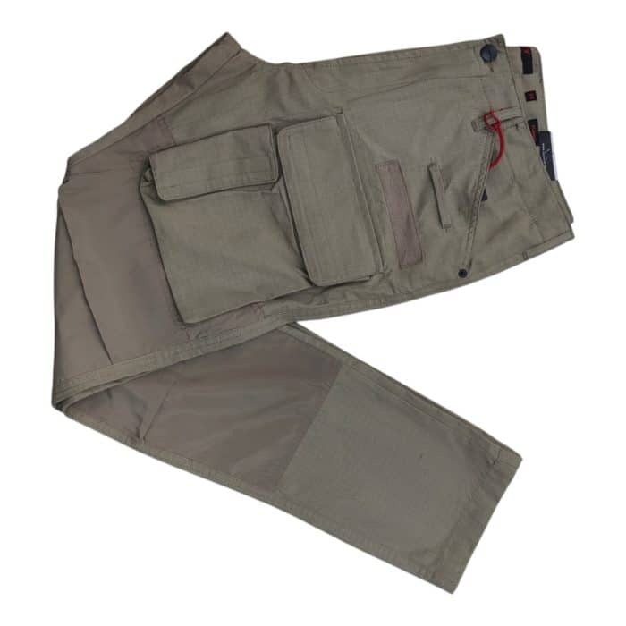 695 13 D | The Cutty Cargo Tobias Taupe combines rugged functionality with a sleek, modern design, crafted from durable, lightweight fabric in a versatile taupe hue. Featuring multiple spacious pockets and reinforced stitching, these pants provide ample storage and lasting durability for both everyday wear and outdoor adventures. With a tailored fit, adjustable waistband, and a clean silhouette, they effortlessly transition from casual to polished looks, making them an essential addition to any wardrobe.