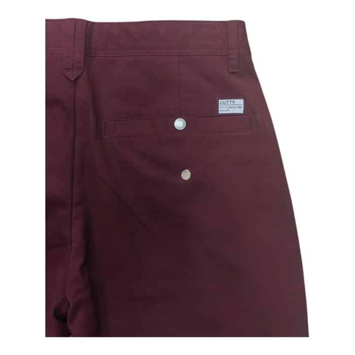 794 1 C | The Cutty Chino Hot Burgundy offers a perfect blend of bold style and everyday comfort, crafted from premium cotton with a touch of elastane for a slim-fit design that provides flexibility and durability. Its rich burgundy tone adds a sophisticated edge, making it a versatile choice for pairing with casual T-shirts or dressy button-downs, effortlessly transitioning between relaxed and formal settings. Featuring practical details like a flexible waistband, slanted front pockets, and button-secured back pockets, these chinos ensure both a polished look and functional convenience for any occasion.