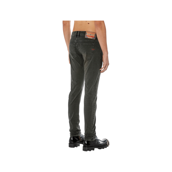 866 14A | The Diesel 1979 Sleenker Slim Skinny Jeans in Washed Black Denim offer a sleek and modern style, combining a slim-skinny fit with a comfortable mid-rise waist for a flattering and confident look. Crafted from premium stretch denim, these jeans feature a washed black finish with subtle fading and whiskering, making them versatile for both casual outings and evening wear. With durable construction, a classic five-pocket design, and signature Diesel branding, they deliver a perfect blend of fashion, functionality, and sophistication.