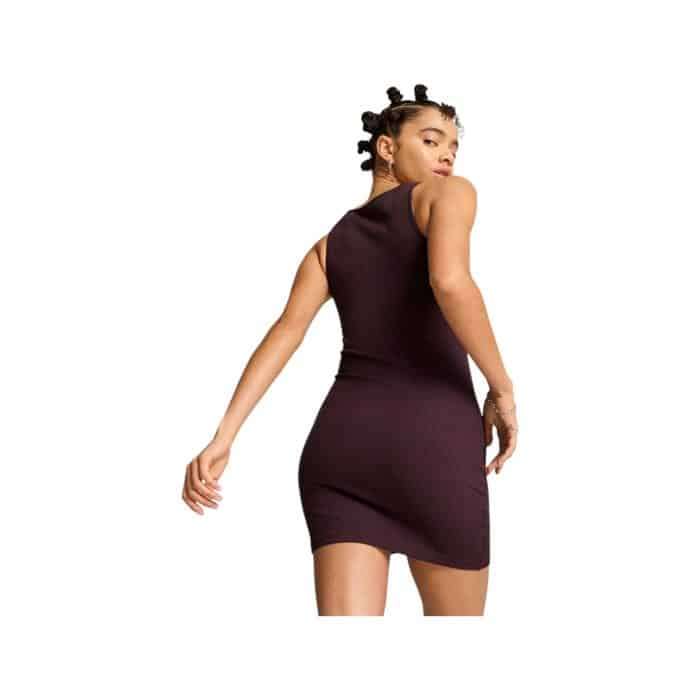 995 6 D | The Puma Dress Classics Ribbed Midnight Plum is a stylish and versatile piece that blends modern elegance with everyday comfort. Featuring a flattering ribbed texture and a tailored silhouette, this dress hugs your curves gracefully while offering all-day ease with its soft, stretchy fabric. Its rich Midnight Plum hue adds a sophisticated touch, making it perfect for both casual outings and semi-formal occasions.