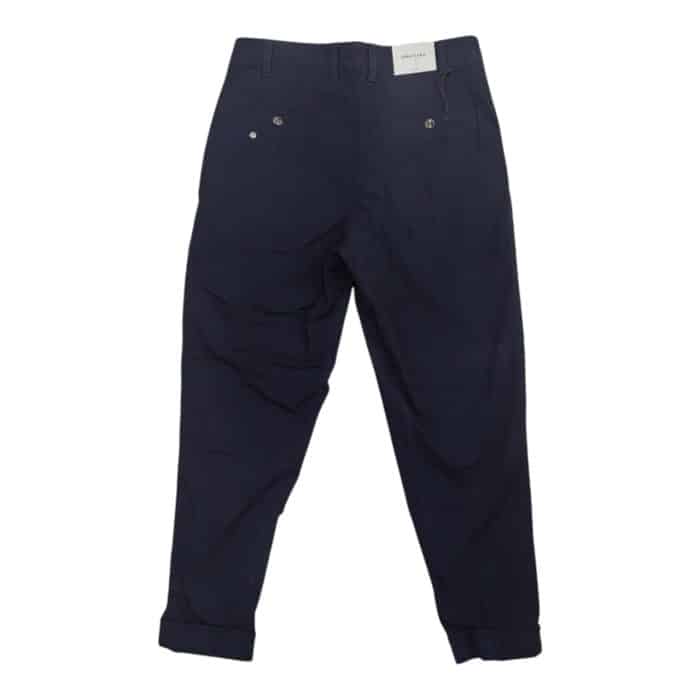 331 44 A | The JD Chino Tapered Cropped Turn-Ups in Navy offer a sleek and modern design with a tapered fit that narrows from the thigh to the ankle, providing a flattering silhouette perfect for both casual and semi-formal occasions. Featuring stylish cropped hems with turn-ups, these chinos blend classic tailoring with a contemporary twist, showcasing your footwear while elevating your overall look with a polished finish. Crafted from a high-quality cotton blend, the chinos ensure all-day comfort and durability, offering flexibility and breathability for a versatile wardrobe staple that can be dressed up or down effortlessly.