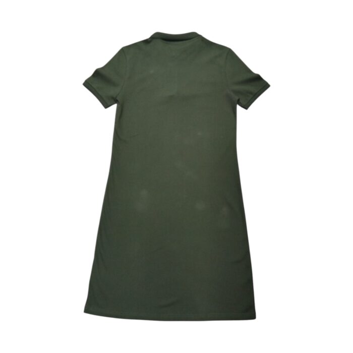 1014 7 A | <p data-pm-slice="1 1 []">The Polo Cara Golfer Dress in Olive is a timeless blend of sporty sophistication and feminine charm, featuring a breathable cotton blend fabric that ensures all-day comfort while maintaining a polished appearance. Its tailored silhouette, button-up polo collar, and defined waistline create a flattering fit, while the short sleeves and slightly flared hem provide effortless movement for any occasion. Versatile and easy to style, this dress transitions seamlessly from casual outings to refined gatherings, making it an essential wardrobe staple that offers both elegance and practicality.</p>