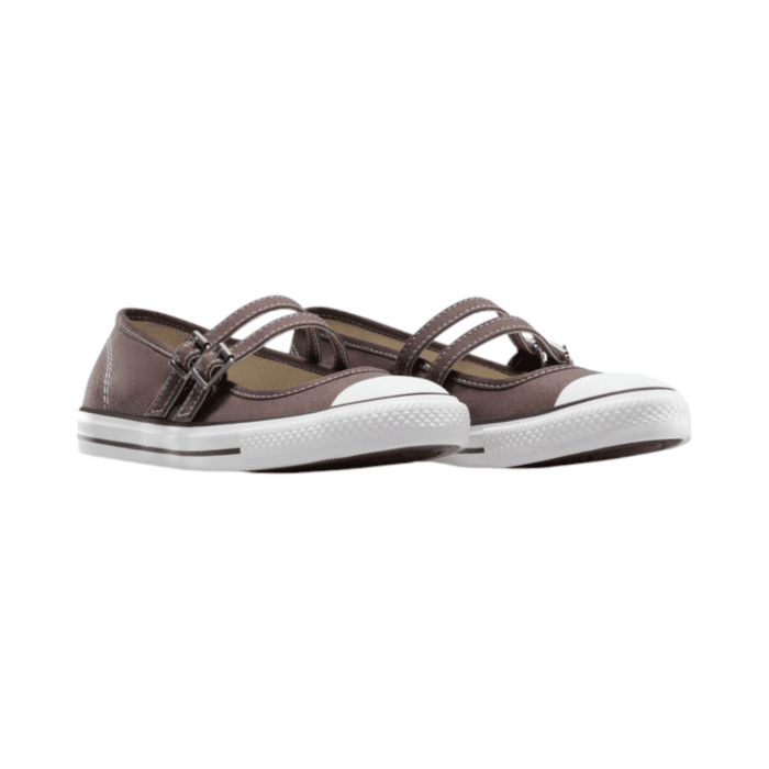 125 43A | The Converse CTAS Dainty Mary Jane Slip - Plum blends timeless Mary Jane elegance with iconic Converse style. Featuring a sleek Plum canvas upper, dual adjustable straps, and a signature rubber toe cap, this lightweight slip-on offers both style and comfort. With a low-profile design, vulcanized sole for superior grip, and versatile appeal, it's perfect for everyday wear, whether paired with dresses or jeans. Comfortable, chic, and easy to wear, this shoe is a must-have for effortless, all-day style.