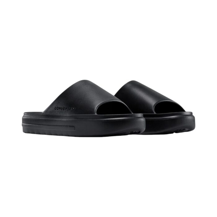 125 47 A | The Converse Essential Slide Slip Black offers a sleek and minimalist design, featuring a clean black colorway and a wide, comfortable strap adorned with the iconic Converse logo, making it a versatile addition to any casual or semi-formal outfit. Crafted with a cushioned footbed for superior comfort and a durable synthetic upper, these slides provide excellent support and grip, ensuring stability and long-lasting wear for everyday activities. Easy to maintain and effortlessly stylish, this slide is the perfect combination of practicality and timeless design, making it an essential choice for those who value comfort and classic aesthetics.