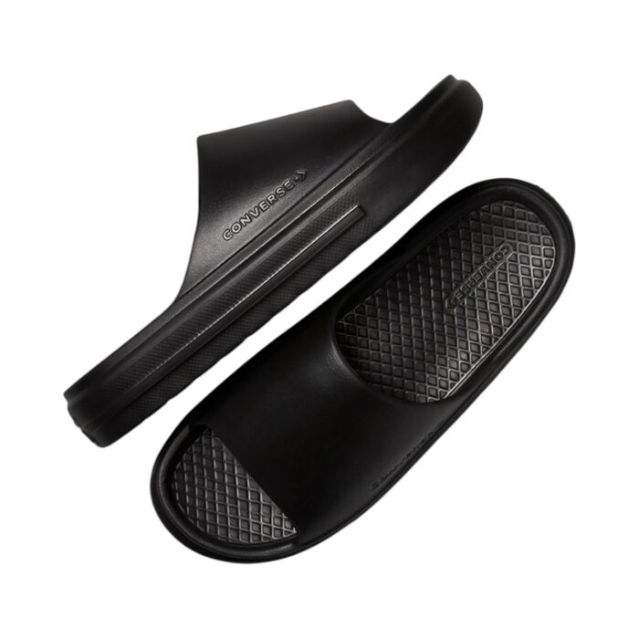 125 47 B | The Converse Essential Slide Slip Black offers a sleek and minimalist design, featuring a clean black colorway and a wide, comfortable strap adorned with the iconic Converse logo, making it a versatile addition to any casual or semi-formal outfit. Crafted with a cushioned footbed for superior comfort and a durable synthetic upper, these slides provide excellent support and grip, ensuring stability and long-lasting wear for everyday activities. Easy to maintain and effortlessly stylish, this slide is the perfect combination of practicality and timeless design, making it an essential choice for those who value comfort and classic aesthetics.