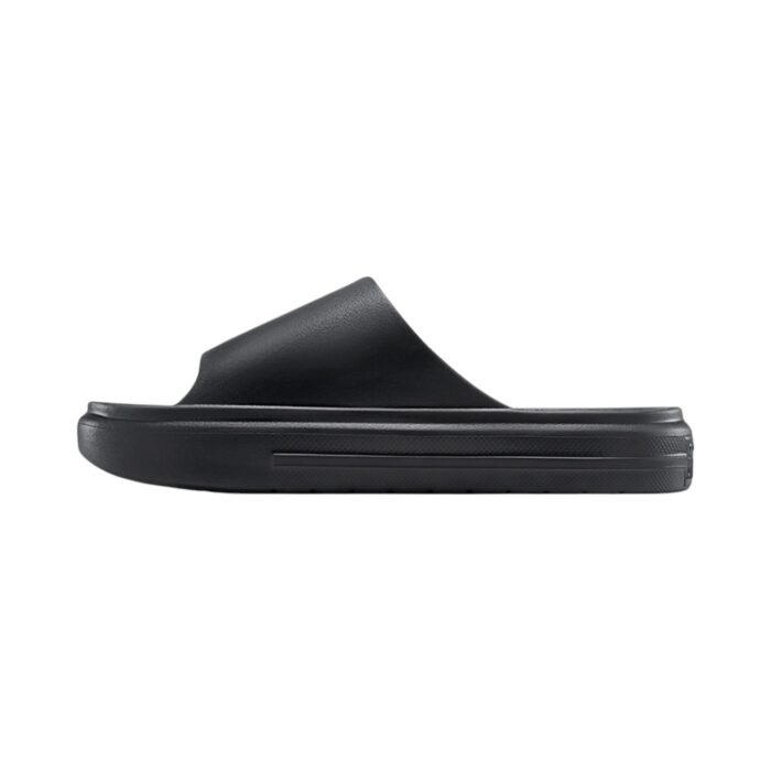 125 47 D | The Converse Essential Slide Slip Black offers a sleek and minimalist design, featuring a clean black colorway and a wide, comfortable strap adorned with the iconic Converse logo, making it a versatile addition to any casual or semi-formal outfit. Crafted with a cushioned footbed for superior comfort and a durable synthetic upper, these slides provide excellent support and grip, ensuring stability and long-lasting wear for everyday activities. Easy to maintain and effortlessly stylish, this slide is the perfect combination of practicality and timeless design, making it an essential choice for those who value comfort and classic aesthetics.