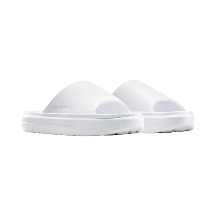 125 48 A | The Converse Essential Slide Slip White offers a sleek and minimalist design, featuring a clean white colorway and a wide, comfortable strap adorned with the iconic Converse logo, making it a versatile addition to any casual or semi-formal outfit. Crafted with a cushioned footbed for superior comfort and a durable synthetic upper, these slides provide excellent support and grip, ensuring stability and long-lasting wear for everyday activities. Easy to maintain and effortlessly stylish, this slide is the perfect combination of practicality and timeless design, making it an essential choice for those who value comfort and classic aesthetics.