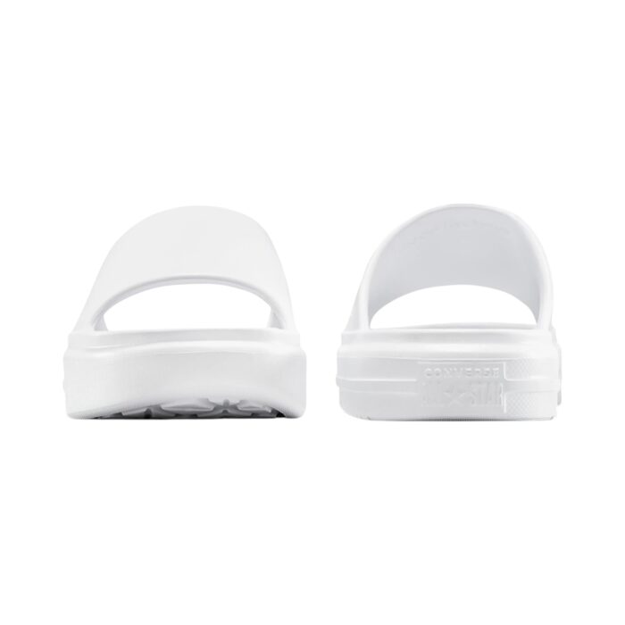 125 48 C | The Converse Essential Slide Slip White offers a sleek and minimalist design, featuring a clean white colorway and a wide, comfortable strap adorned with the iconic Converse logo, making it a versatile addition to any casual or semi-formal outfit. Crafted with a cushioned footbed for superior comfort and a durable synthetic upper, these slides provide excellent support and grip, ensuring stability and long-lasting wear for everyday activities. Easy to maintain and effortlessly stylish, this slide is the perfect combination of practicality and timeless design, making it an essential choice for those who value comfort and classic aesthetics.