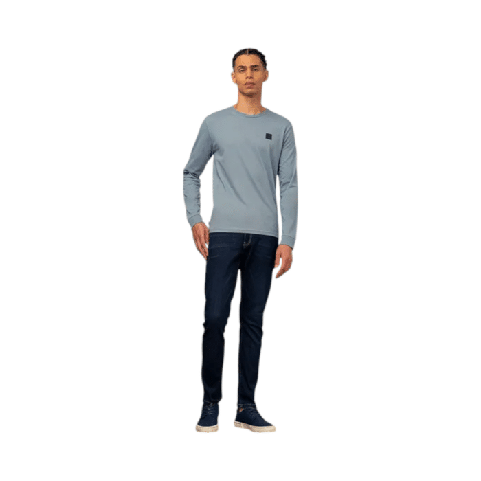 304 1CC | The Polo Essential Long Sleeve Custom Fit Crew Blue is a timeless wardrobe staple crafted from premium cotton, offering a soft, breathable feel with a tailored fit that sits perfectly between classic and slim styles for all-day comfort. Designed in a rich blue hue, this versatile long-sleeve crewneck seamlessly pairs with jeans, chinos, or joggers, making it an effortless choice for both casual and refined looks while featuring the iconic Polo embroidered logo for a touch of heritage. With ribbed cuffs and hem ensuring durability and a snug fit, this essential piece maintains its shape and style through every season, whether worn alone or layered for added warmth.