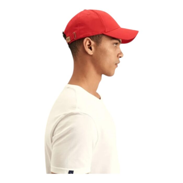 318 5 A | The Polo Cap 6 Panel Classic Peak Red combines timeless style with superior comfort, featuring a structured six-panel design that provides a secure fit and a sleek, polished look. Made from high-quality, breathable fabric, this cap ensures long-lasting durability while keeping you cool, and its adjustable strap allows for a customized fit suitable for all head sizes. With its bold red color and classic pre-curved peak, this cap adds a touch of sophistication to any outfit, making it perfect for casual wear, outdoor activities, or sporty ensembles.