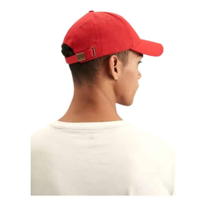 318 5 C | The Polo Cap 6 Panel Classic Peak Red combines timeless style with superior comfort, featuring a structured six-panel design that provides a secure fit and a sleek, polished look. Made from high-quality, breathable fabric, this cap ensures long-lasting durability while keeping you cool, and its adjustable strap allows for a customized fit suitable for all head sizes. With its bold red color and classic pre-curved peak, this cap adds a touch of sophistication to any outfit, making it perfect for casual wear, outdoor activities, or sporty ensembles.