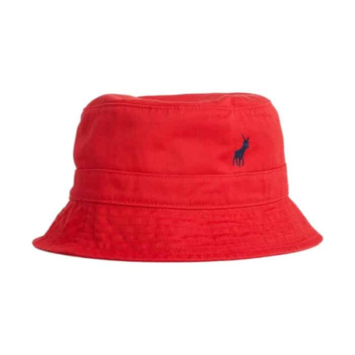 319 22 A | The Polo Sydney Twill Bucket Hat in Red offers a perfect blend of style and functionality. Made from durable twill fabric, this hat is lightweight, comfortable, and built to last. Its bold red color adds a pop of vibrancy to any outfit, while the wide brim provides excellent sun protection. With a soft, breathable lining for extra comfort and an adjustable fit for a personalized experience, this bucket hat is ideal for both casual outings and outdoor activities. Whether you're at the beach or running errands, the Polo Sydney Twill Bucket Hat combines fashion and practicality effortlessly.