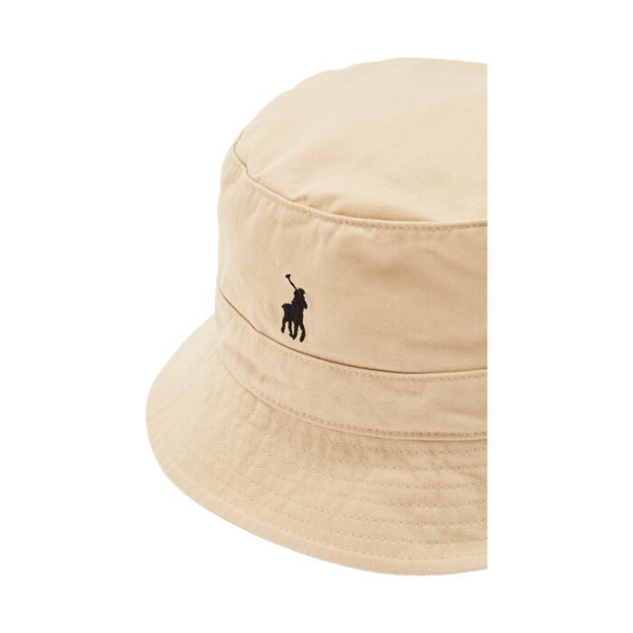 319 9 B | <p data-pm-slice="1 1 []">The Polo Sydney Twill Bucket Hat in Stone is a stylish and versatile accessory crafted from high-quality twill fabric, offering durability and a comfortable fit for various occasions. With its neutral stone color and minimalist aesthetic, this hat effortlessly complements different outfits while the subtle Polo branding adds a refined touch to your look. Designed for both fashion and functionality, it features breathable material for all-day comfort, a wide brim for sun protection, and a relaxed yet secure fit, making it an essential piece for any wardrobe.</p>