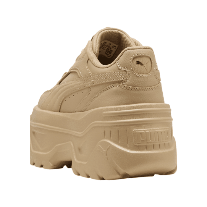 334 89B | Elevate your style with Puma Karmen X-TRA Trainers in Light Sand/Gold. Featuring a chunky platform sole and sleek design, they blend comfort, durability, and trendiness.