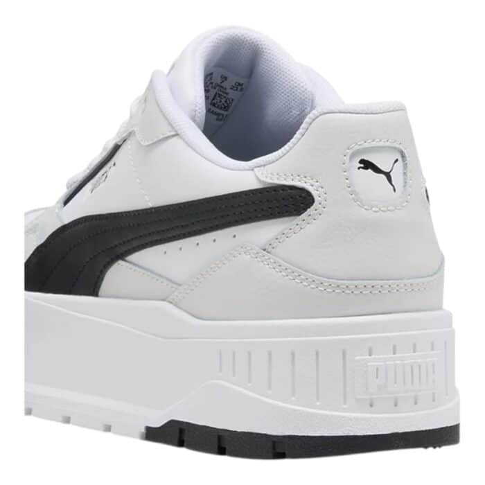 334 90 B | The Puma Karmen II Idol White/Black is a stylish and versatile sneaker that effortlessly combines modern design with outstanding comfort, featuring a sleek low-top silhouette in a bold white and black colorway that suits any casual outfit. With its cushioned insole, breathable mesh inserts, and padded collar, this shoe delivers all-day comfort and support, making it ideal for both athletic activities and everyday wear. Built with durability in mind, the sneaker’s premium materials, including a rubber outsole for reliable traction, ensure long-lasting performance, allowing you to enjoy both style and functionality for years to come.