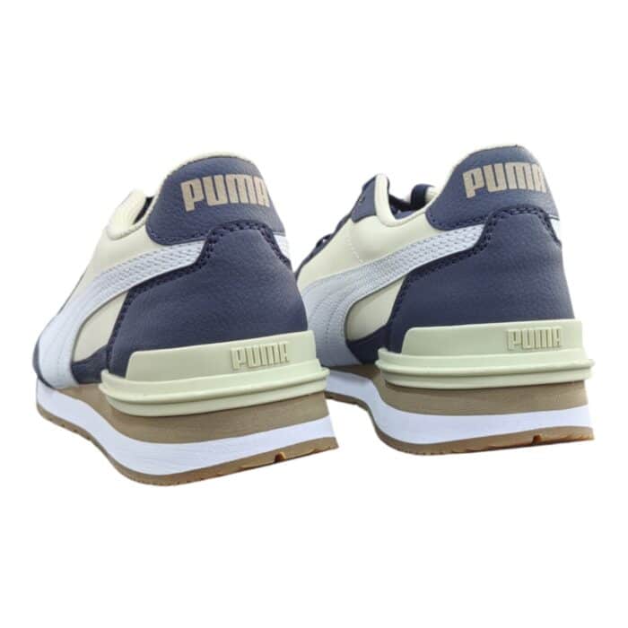 5 195 B | The Puma ST Runner V4 L in Desert Dust, White, Navy, and Taupe seamlessly blends classic running shoe aesthetics with modern comfort, featuring a sleek synthetic leather upper complemented by breathable mesh inserts for enhanced durability and ventilation. Its lightweight EVA midsole provides exceptional cushioning and shock absorption, ensuring all-day comfort, while the rubber outsole offers superior traction and stability on various surfaces, making it perfect for both casual wear and active lifestyles. Designed with a padded collar and tongue for a snug fit, this versatile sneaker effortlessly combines style and functionality, allowing you to move with confidence while maintaining a fresh, timeless look.