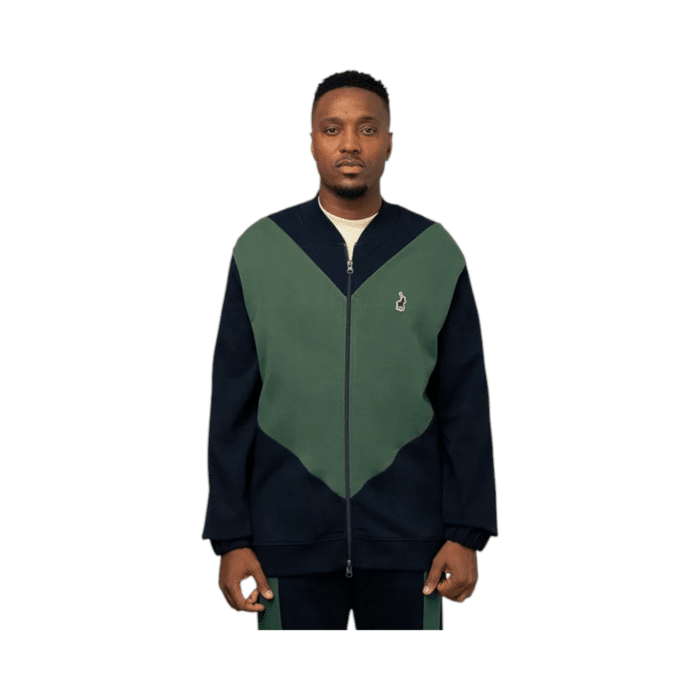 638 16BB | The Polo Sport Men’s Tracksuit Long Sleeve Zip Thru – Navy/Green combines modern athletic style with premium comfort, featuring a sleek navy base accented by bold green details for a striking yet versatile look. Designed with a full-zip front, ribbed cuffs, and an adjustable drawstring waistband, this tracksuit ensures a secure fit, ease of movement, and all-day comfort, making it perfect for workouts, casual outings, or lounging. Crafted from breathable, moisture-wicking fabric with a soft inner lining, it provides optimal temperature regulation, durability, and a fresh feel, ensuring you stay stylish and comfortable in any setting.